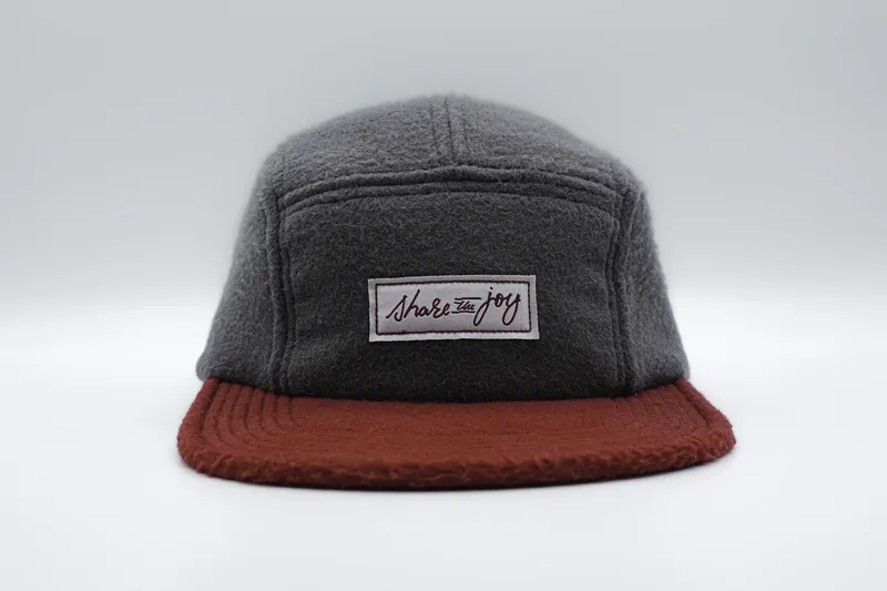 Camper hats wool obermeyer anthem branding 1