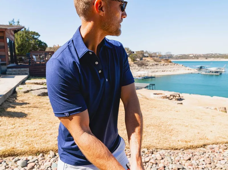 Criquet performance range polo in the navy by anthem branding 2