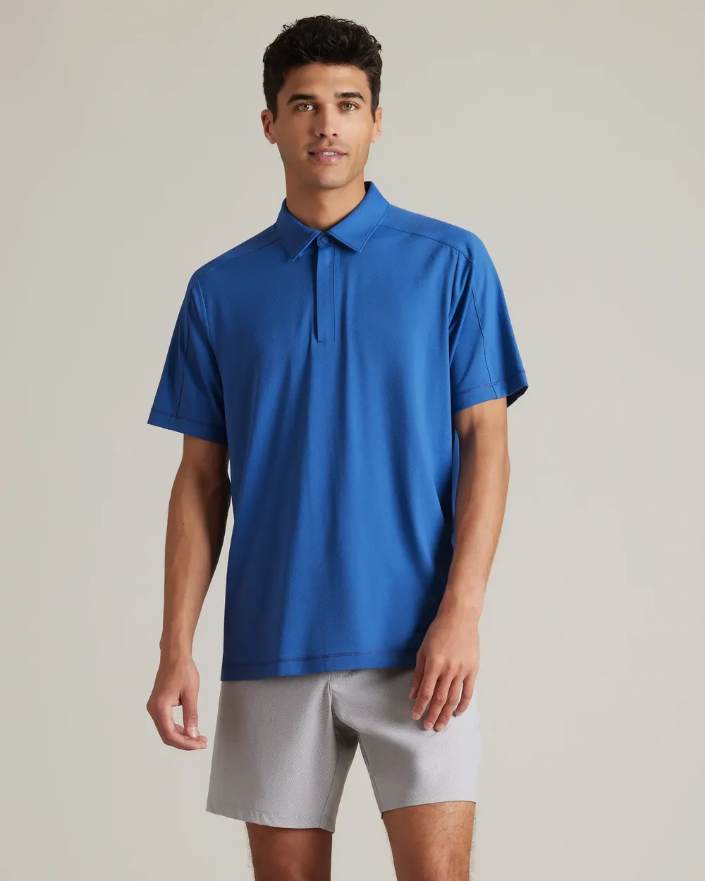 Rhone mens Momentum Tech Golf Polo by anthem branding
